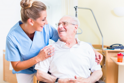 senior men and old age nurse in nursing home