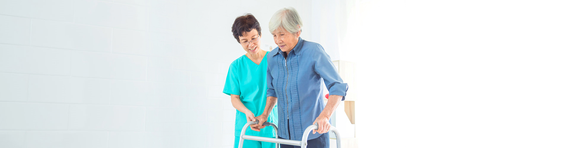 old woman assisted by her nurse