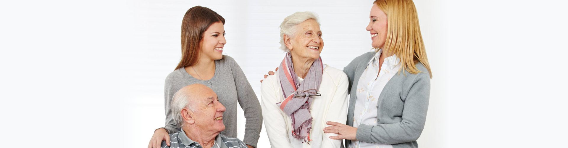 caregivers smiling with seniors